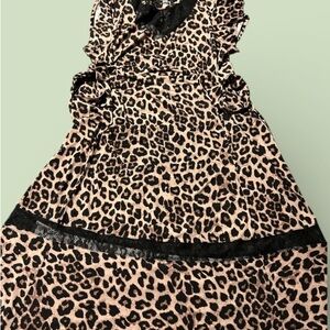Leopard Print Dress with pockets and Black lace Accents.